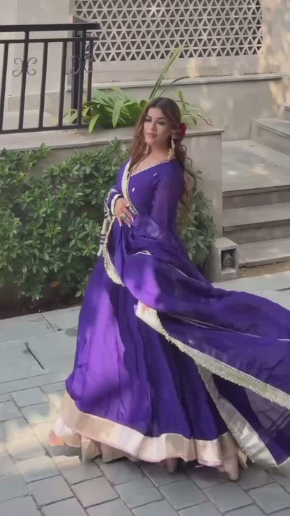 Aarvika’s Royal Purple Elegant Golden Border Anarkali Suit Set